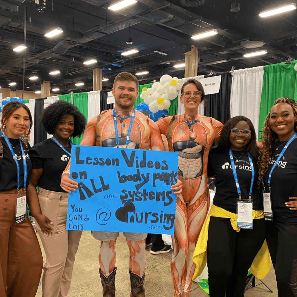 NURSING.com team interacting with nursing students at a conference, providing expert support and answering questions—showing why NURSING.com is the top choice for customer service compared to Simple Nursing.